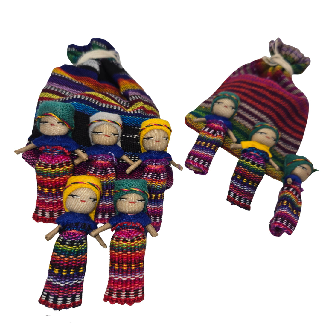 Colorful dolls with traditional clothing on a white background